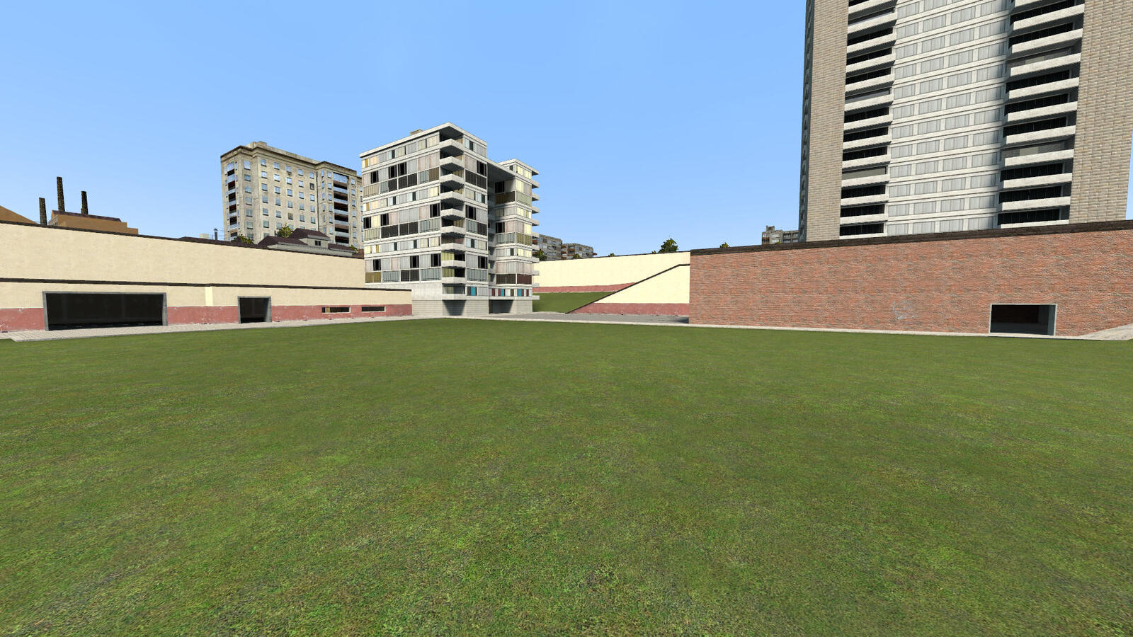 gm_construct im Spiel: Blick über die Wiese zu den Hochhäusern